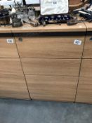A 3 drawer teak effect office chest