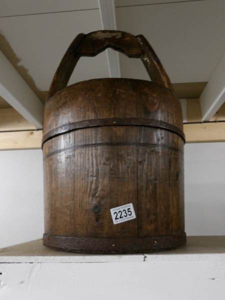 A wooden bucket.