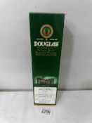 A boxed bottle of Douglas of Drumlarig single malt Scotch whisky.