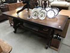 A long oak refectory/dining table