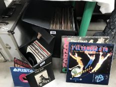 A case of LP records and a case of 45rpm records - mostly 1970/80's including The Jam, ELO,