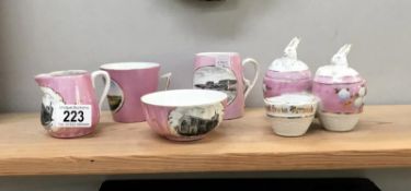 A quantity of pink tourist ware china including Horncastle and Cleethorpes etc.