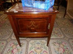 A mahogany inlaid wash stand with marble inset top.