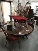 A 1960/70's drop leaf dining table and 4 chairs