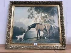 A gilt framed print of dog and horse