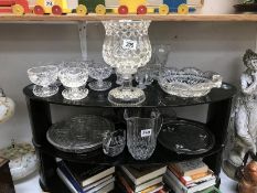 2 shelves of glass bowls, vases etc.