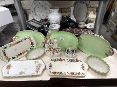 A quantity of pottery and porcelain trays including Royal Grimwade, Poole etc.