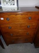 A 1930's oak chest of drawers.