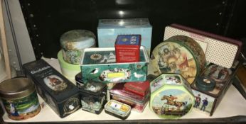 A shelf of collectors tins