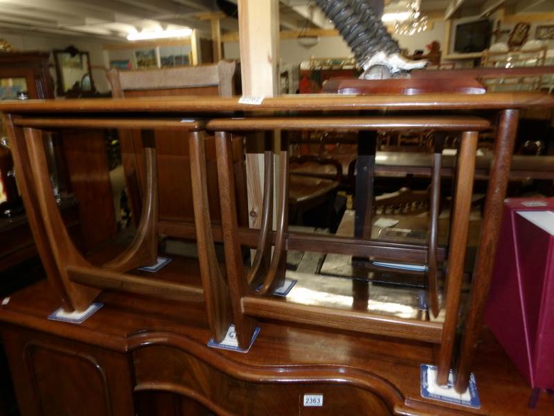 A nest of 3 retro teak coffee tables by G Plan,.