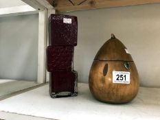 A replica tea caddy in the shape of a pear and a replica brick layer vase