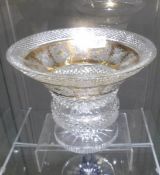 A gold decorated cut glass vase.