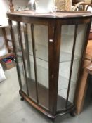 A china display cabinet with glass shelves