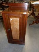 A Victorian mahogany pot cupboard.