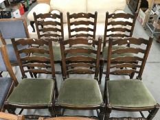 A set of 6 oak ladderback dining chairs