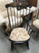 a 1960's stitch back rocking chair