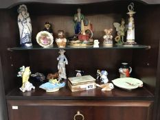 A quantity of porcelain & china ornaments etc. Including Carlton & Doulton etc.