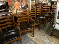 A good set of 6 oak ladder back dining chairs including 2 carvers.