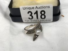 A silver ring stamped 925