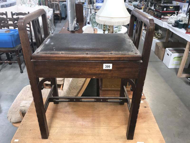 An Edwardian piano stool