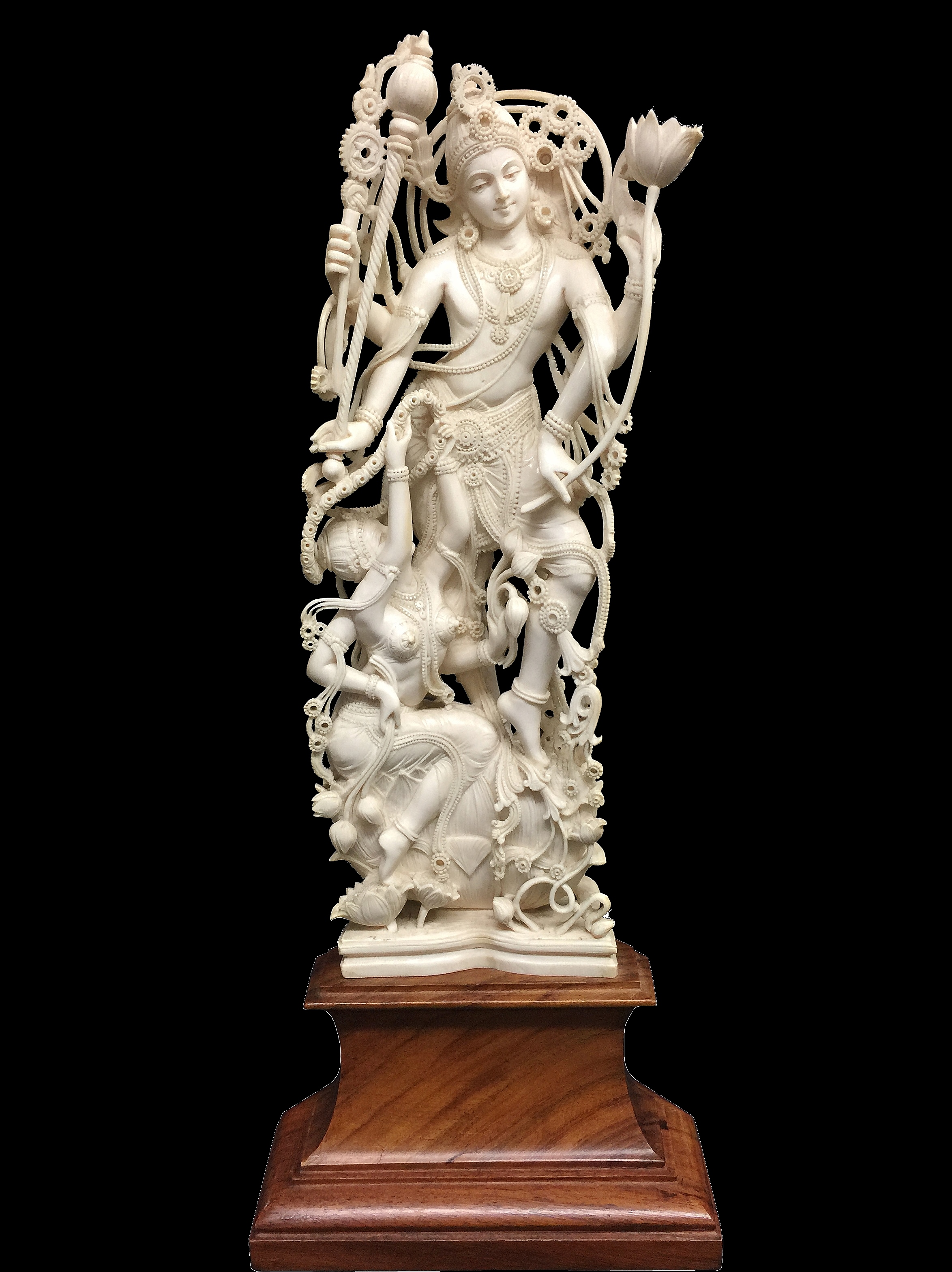 An ivory figure of Durga on a teak base with radiocarbon dating measurement report dated February