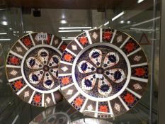 A pair of Royal Crown Derby Old Imari pattern plates.