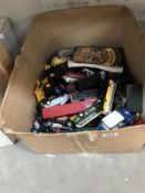 A large box of unboxed Diecast cars etc.