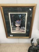 A framed and glazed print of an urn at Sudely Castle