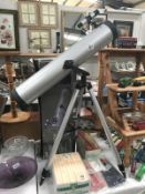 A Zennox 76 x 700 telescope with box and accessories
