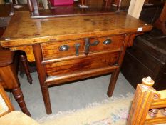 A console table with 2 drawers and latch.