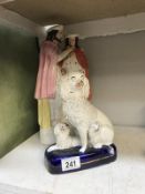 A Victorian Staffordshire flat back and a Victorian Staffordshire dog figure of a Poodle with 2