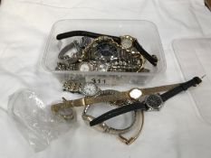 A box of assorted watches (8 in working order) including Timex, Limit, Accurist, Lorus etc.