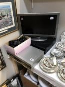 A Finflux TV, Toshiba video and DVD player,