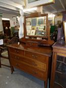 An Edwardian mahogany inlaid dressing table,