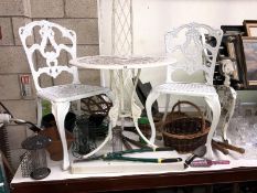 A cast aluminium garden table and 2 chairs