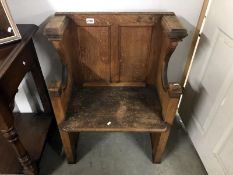 A 19th century oak hall seat.