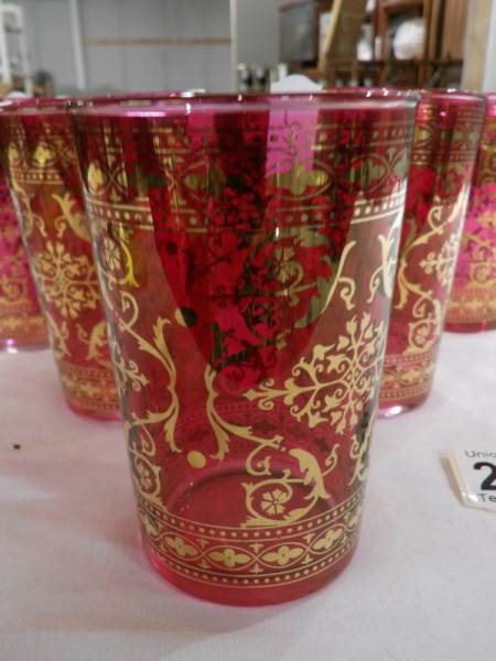 A set of 6 Italian cranberry glass tumblers overlaid with gold decoration. - Image 2 of 2