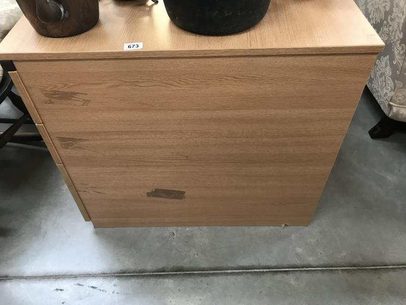 A 3 drawer pine Effect office chest