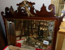 A 19th century mahogany framed bevel edged mirror.