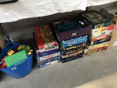 A large quantity of board games and jigsaws (completeness unknown)