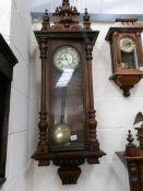 A Victorian double weight mahogany Vienna wall clock.