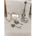 2 filigree photo frames (possibly silver), 2 babies rattles and 2 other items.