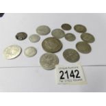 A quantity of pre 1920 silver coins from the reigns of Queen Victoria,