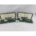 2 cased silver tea spoons with Lincoln Imp finials. Cases marked Ushers Of Lincoln.