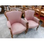 A pair of mahogany framed dining chairs (upholstery needs tidying).
