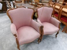 A pair of mahogany framed dining chairs (upholstery needs tidying).