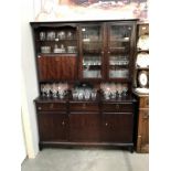 A dark wood stained wall unit.