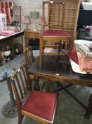 A set of 4 1930s oak dining chairs