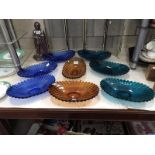 8 coloured art glass dishes by Sowerby, Gateshead.