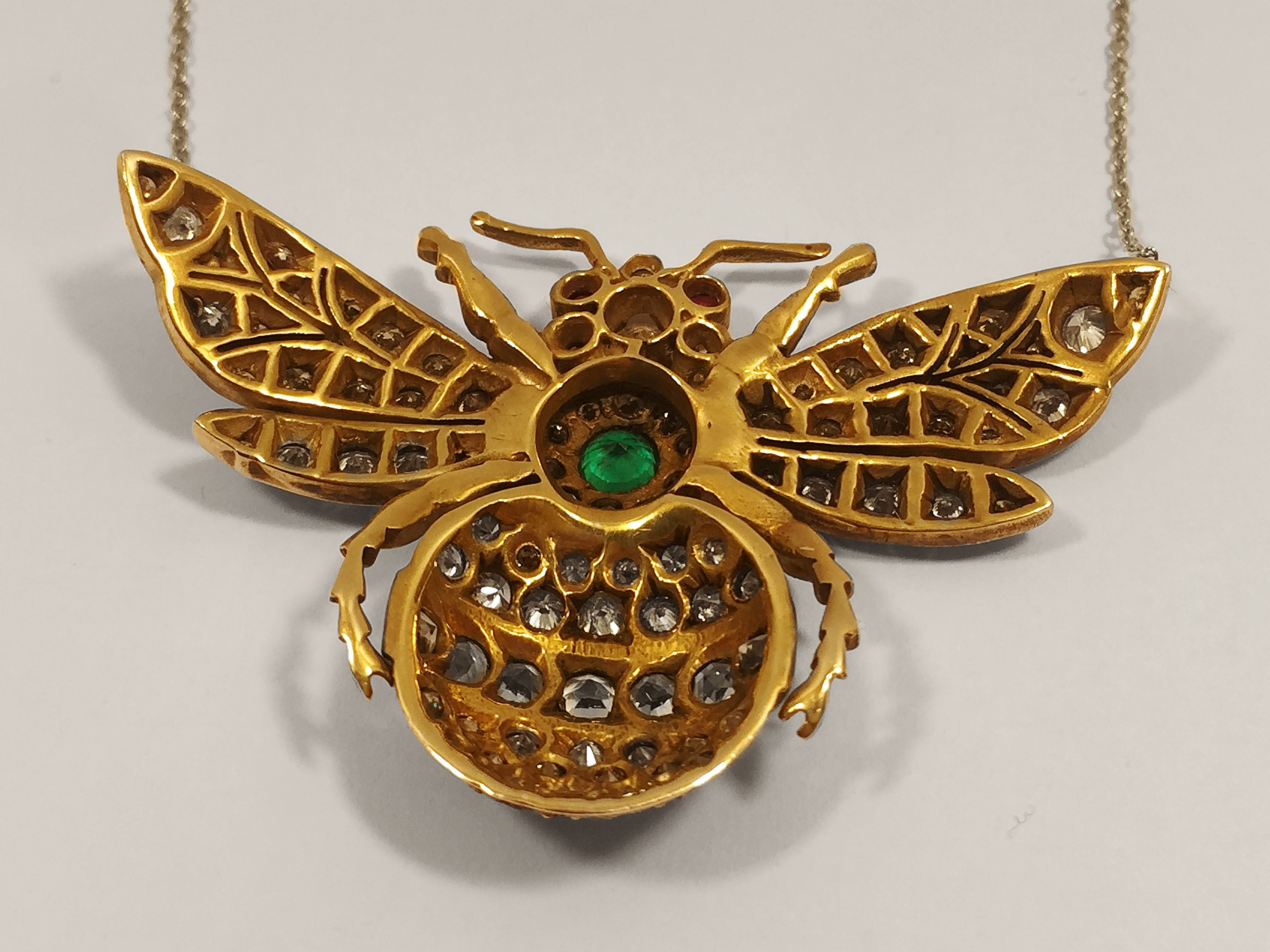 An outstanding 9ct gold 'Bee' pendant with 4 carats of diamonds, central set emerald and ruby eyes. - Image 3 of 5